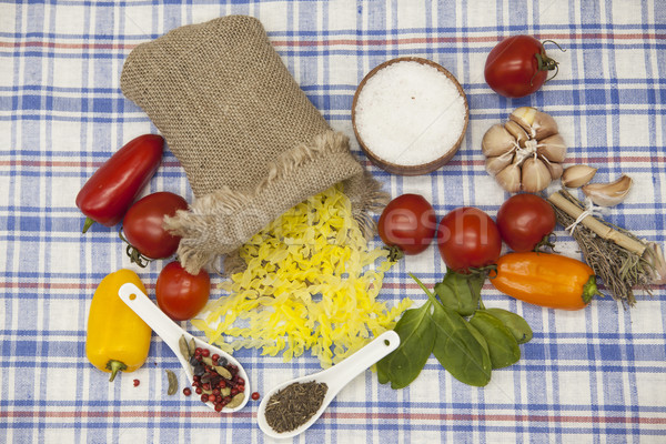 Stock photo: Gemelli Italian pasta gluten-Free  set for the creation : cherry tomatoes, olive oil, balsamic sauce