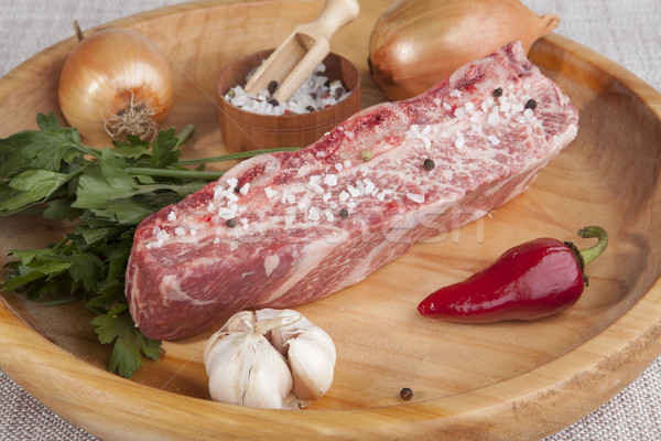 Stück frischen Rindfleisch Petersilie Zwiebel Stock foto © mcherevan