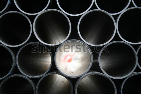 Szürke pvc csövek egymásra pakolva építkezés víz Stock fotó © mehmetcan