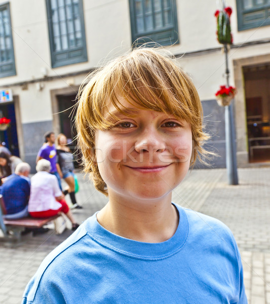 smart boy enjoys walking in the pedestrian zone  Stock photo © meinzahn