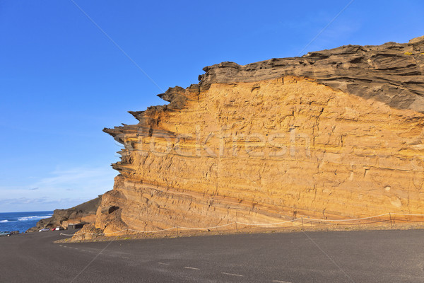 volcanic stone formation with blue sky at el Golfo, Lanzarote Stock photo © meinzahn