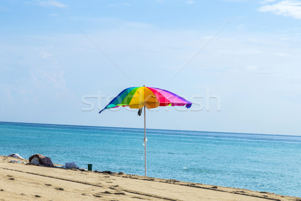 Parasol coloré sable plage ciel soleil [[stock_photo]] © meinzahn