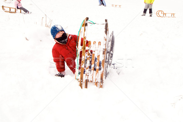 child sledding down the hill in snow, white winter Stock photo © meinzahn