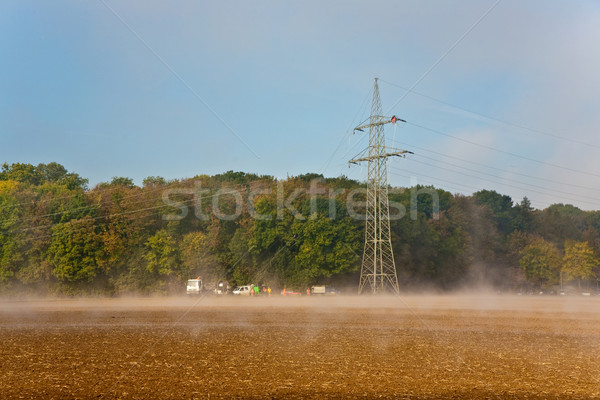 a pylon will be setted up in foggy weather in beautiful landscap Stock photo © meinzahn