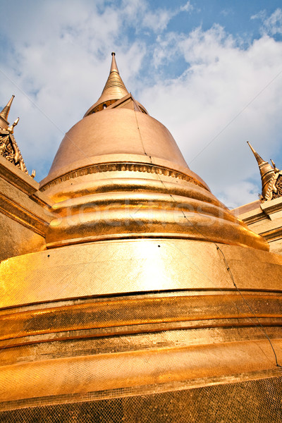 famous temple Phra Sri Rattana Chedi covered with foil gold in t Stock photo © meinzahn
