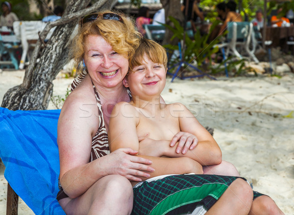 mother hugging with young son in the beach chair  Stock photo © meinzahn