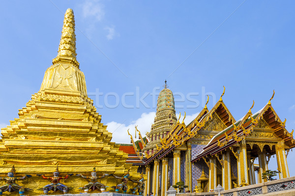 Stock photo: famous temple Phra Sri Ratana Chedi covered with foil gold 
