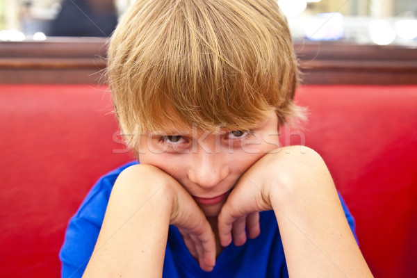 smiling boy in a diners at night Stock photo © meinzahn