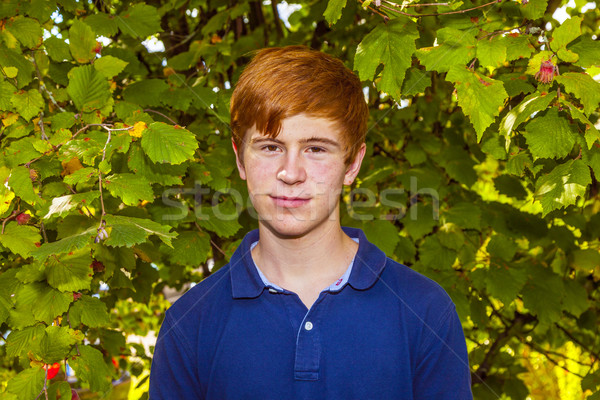 Portret aantrekkelijk gelukkig glimlachend jongen tuin Stockfoto © meinzahn