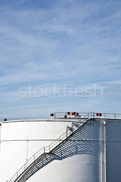 white tanks in tank farm with blue sky  Stock photo © meinzahn