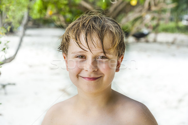 happy boy with wet hair at the beach Stock photo © meinzahn