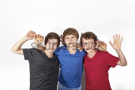 Tre felice gioioso amici blu rosso Foto d'archivio © meinzahn