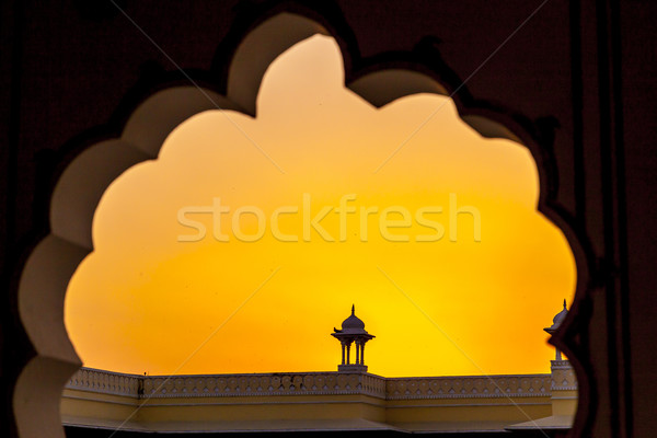 Sunset with view to a top of a small temple in Jaipur  Stock photo © meinzahn