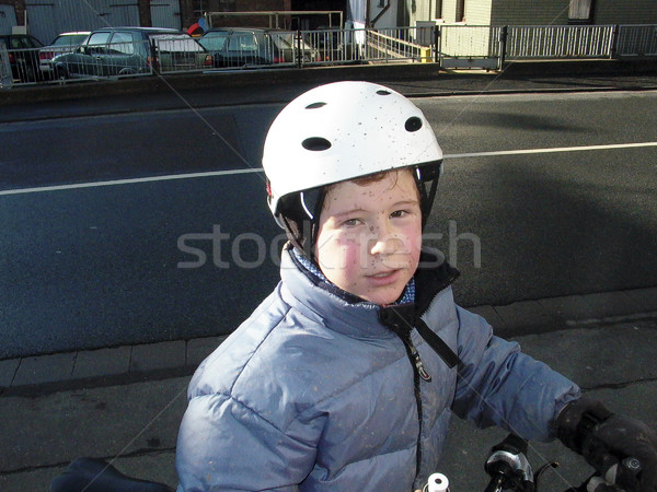 Aranyos fiú bicikli kosz arc lovaglás Stock fotó © meinzahn