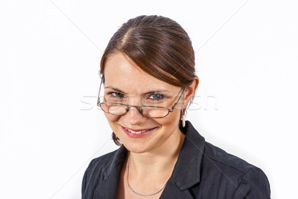 Jeunes belle femme lunettes de lecture blanche femme Photo stock © meinzahn