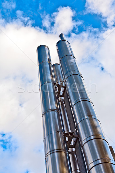 Nieuwe schoorsteen chroom verwarming hemel wolken Stockfoto © meinzahn
