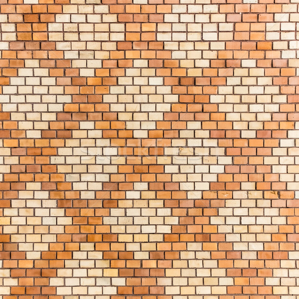 brick wall decorated with geometric motifs Stock photo © meinzahn