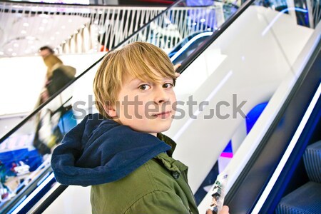 Fiú mozog lépcsőház vásárlás központ aranyos Stock fotó © meinzahn