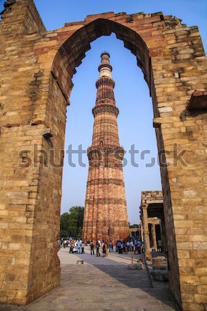 Stockfoto: Delhi · baksteen · minaret · gebouw · stad · zonsondergang