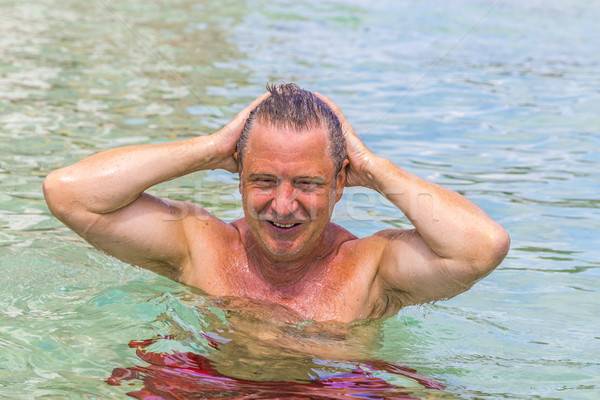 Homme amusement natation océan bel homme plage [[stock_photo]] © meinzahn