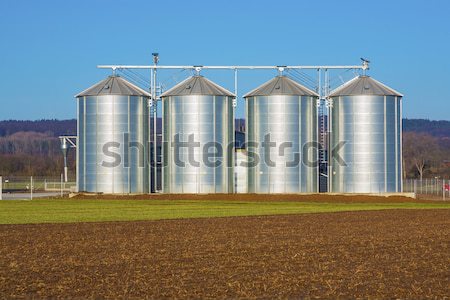 acres with snow in winter with silo in beautiful light and struc Stock photo © meinzahn