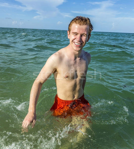 十幾歲的男孩 游泳的 海洋 熱帶 海灘 水 商業照片 © meinzahn
