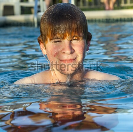 child has fun in the outdoor pool Stock photo © meinzahn