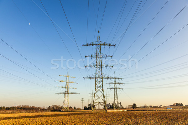 hight voltage tower in rural landscape with blue sky Stock photo © meinzahn