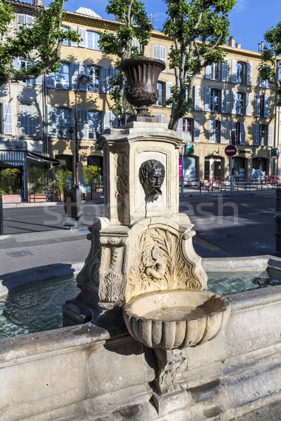 old water fountain with greek roman face at faucet Stock photo © meinzahn