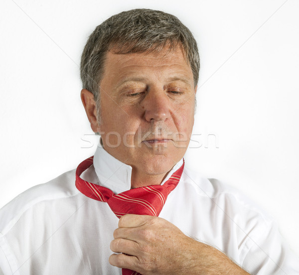 man binding his tie Stock photo © meinzahn