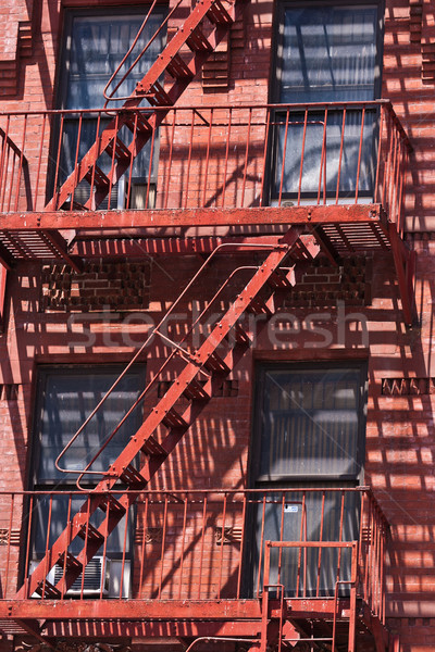 fire ladder at old houses downtown in New York Stock photo © meinzahn