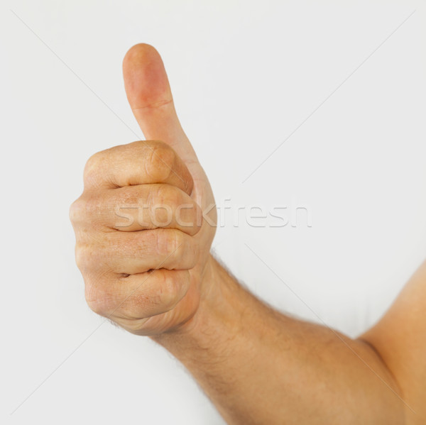thumbs up sign isolated on white Stock photo © meinzahn