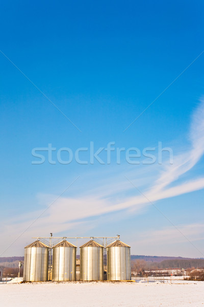 landscape with silo and snow white acre with blue sky Stock photo © meinzahn