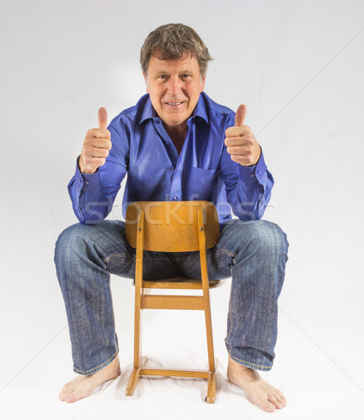 Man klein houten stoel teken knappe man Stockfoto © meinzahn