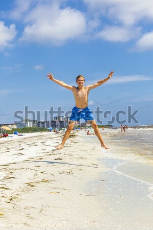 Fiú levegő tengerpart mosoly szépség nyár Stock fotó © meinzahn
