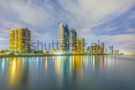 skyline of Miami sunny isles by night with reflections at the oc Stock photo © meinzahn
