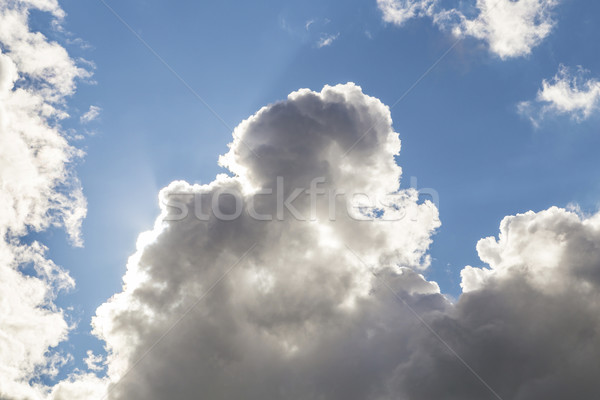 Cumulus Clouds And Grey Storm Clouds Gathering On Blue Sky Stock photo © meinzahn