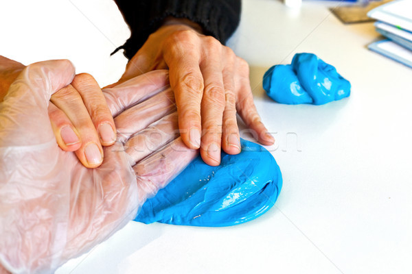 Stock photo: hand physiotherapy to recover a broken finder