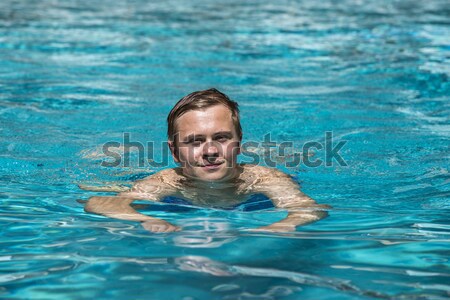young boy  swimming in the pool Stock photo © meinzahn