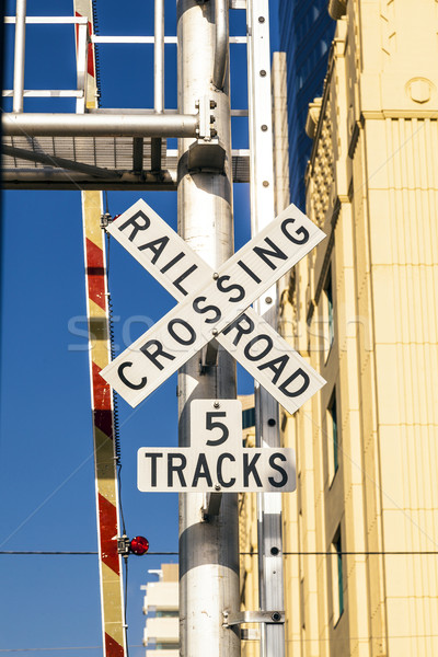 railroad crossing sign with blue sky Stock photo © meinzahn