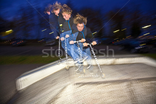 boy jumping over a ramp Stock photo © meinzahn