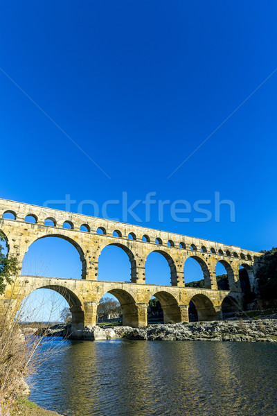 Pont du Gard is an old Roman aqueduct near Nimes  Stock photo © meinzahn
