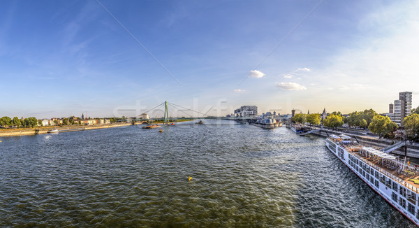 skyline of Cologne with river Rhine in late afternoon and cruise Stock photo © meinzahn