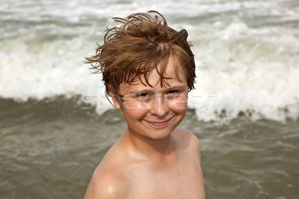 portrait of smart boy at the beach Stock photo © meinzahn