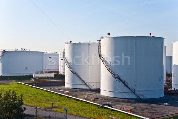 white tanks in tank farm with blue sky Stock photo © meinzahn