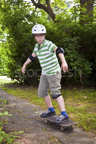 young boy on his skate board  Stock photo © meinzahn