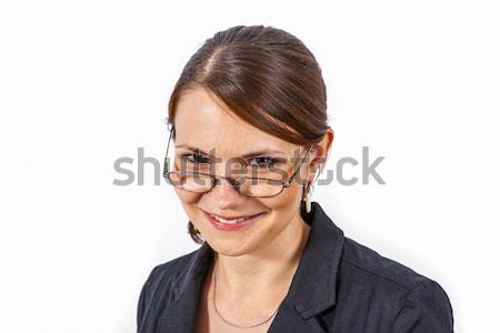 Primer plano jóvenes mujer hermosa gafas de lectura blanco mujer Foto stock © meinzahn