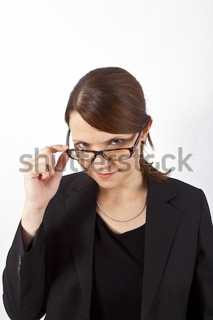 Genç güzel bir kadın okuma gözlükleri beyaz kadın Stok fotoğraf © meinzahn
