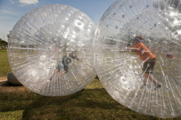 child has a lot of fun in the Zorbing Ball Stock photo © meinzahn