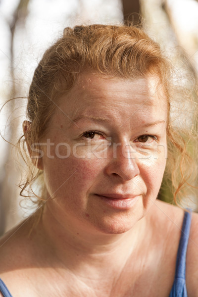 beautiful woman with red hair  Stock photo © meinzahn